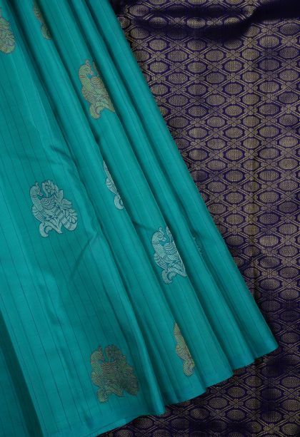 Teal Kanchipuram Silk Sarees with Gold Zari Buttis (small Dots Or Motifs)