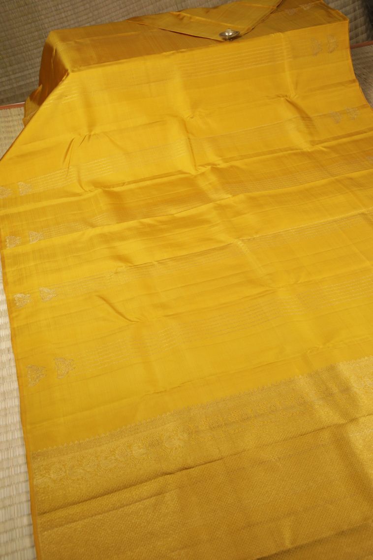 Yellow Kanchipuram Silk Sarees with Gold Zari Stripes view 2