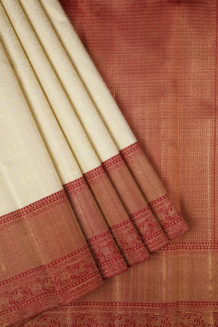 White Kanchipuram Silk Sarees with Gold Zari Floral Patterns view 1