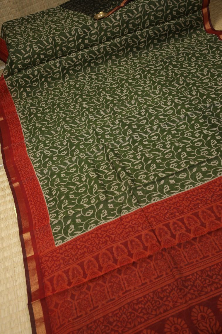 Moccon Green Chanderi Cotton Sarees with Without Zari Zari Geometric Shapes view 2