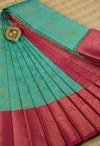 Green Visiri Madippu Silk Sarees with Copper Zari Floral Patterns