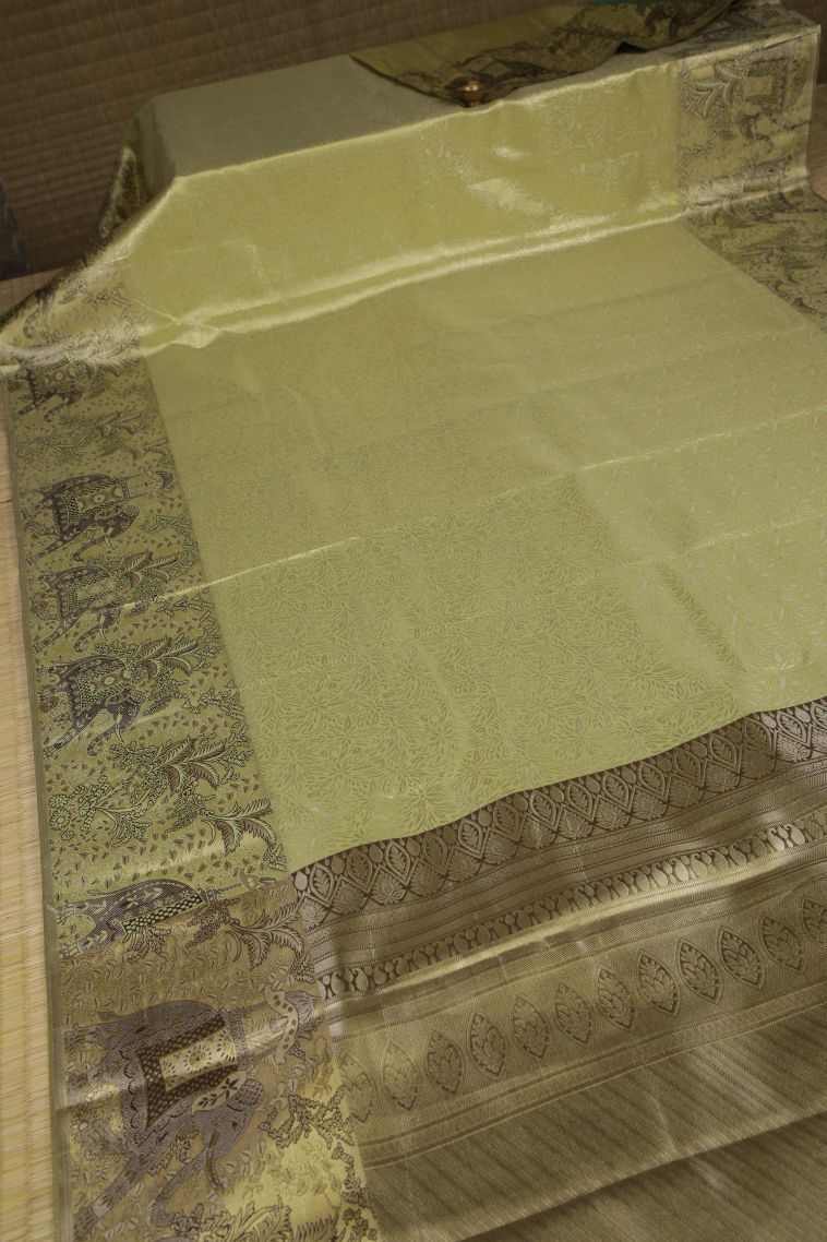 Olive Green Tissue Silk Sarees with Silver Zari Floral Patterns view 2