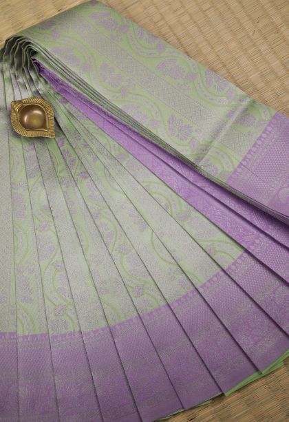 Pistachio Green Visiri Madippu Silk Sarees with Silver Zari Floral Patterns