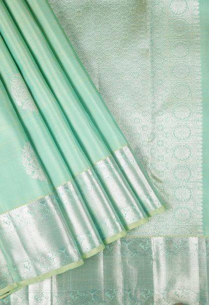 Mint Green Kanchipuram Silk Sarees with Silver Zari Buttis (small Dots Or Motifs)