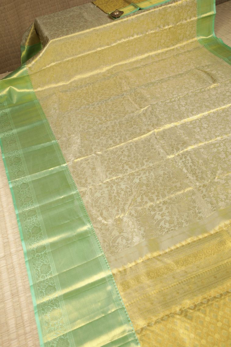 Pistachio Green Kanchipuram Silk Sarees with Gold Zari Floral Patterns view 2