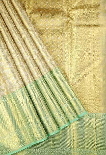 Pistachio Green Kanchipuram Silk Sarees with Gold Zari Floral Patterns