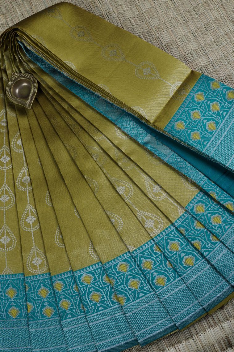 Olive Green Visiri Madippu Silk Sarees with Silver Zari Floral Patterns view 1
