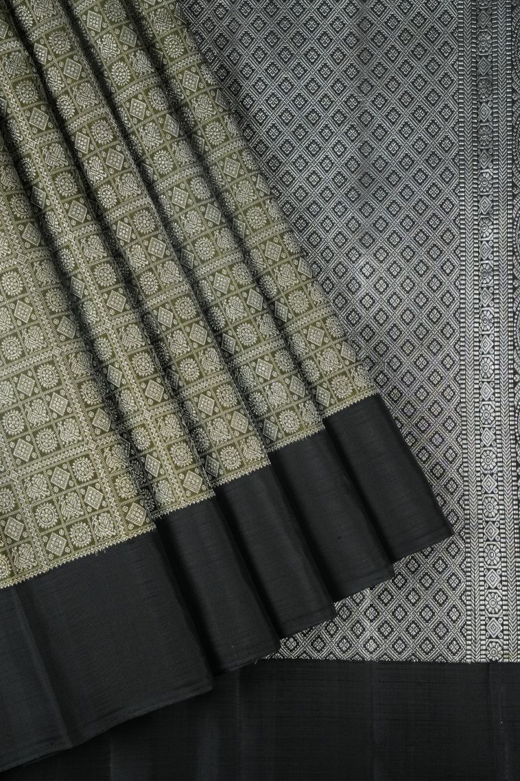Moccon Green Kanchipuram Silk Sarees with Silver Zari Floral Patterns view 1