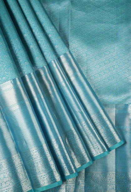 Sky Blue Kanchipuram Silk Sarees with Silver Zari Floral Patterns