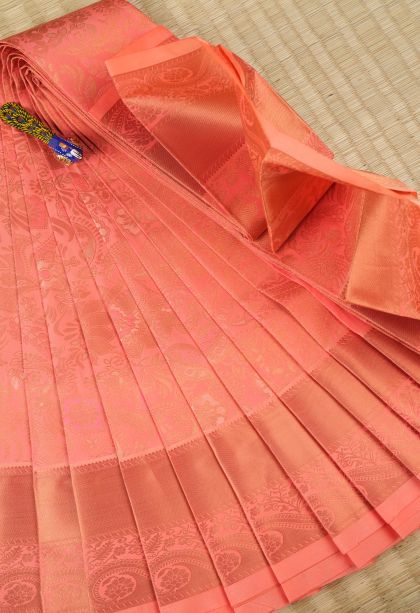 Cantaloupe Orange Visiri Madippu Silk Sarees with Copper Zari Floral Patterns