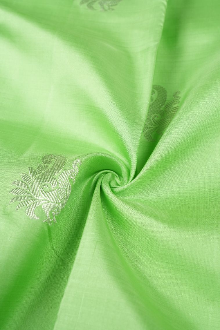 Lime Green Kanchipuram Silk Sarees with Silver Zari Peacock Motifs view 4