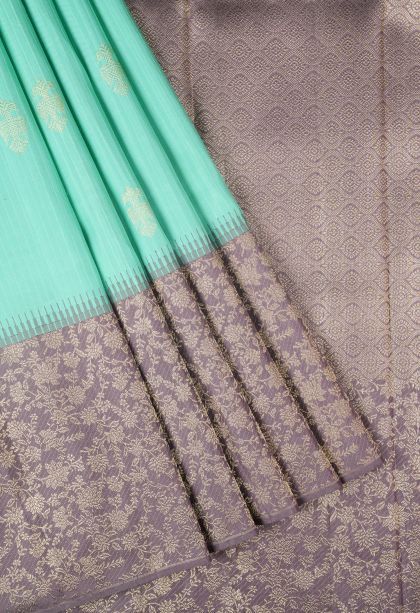 Sky Blue Kanchipuram Silk Sarees with Gold Zari Peacock Motifs