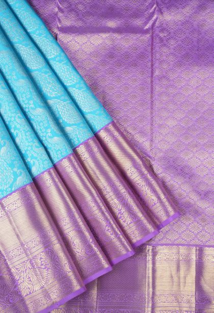 Arctic Blue Kanchipuram Silk Sarees with Silver Zari Floral Patterns