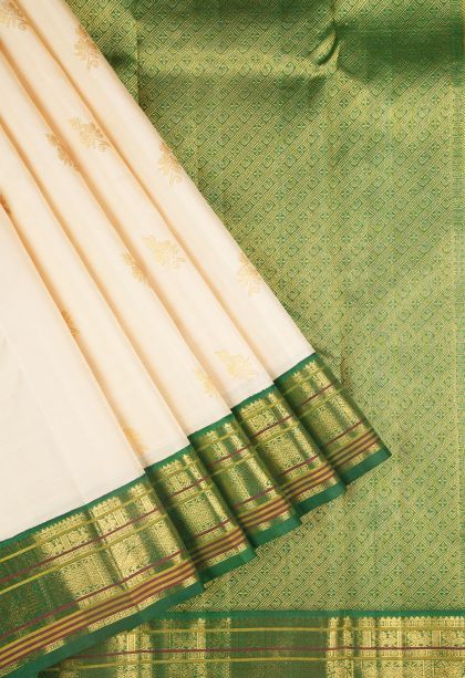 Cream White Kanchipuram Silk Sarees with Gold Zari Buttis (small Dots Or Motifs)