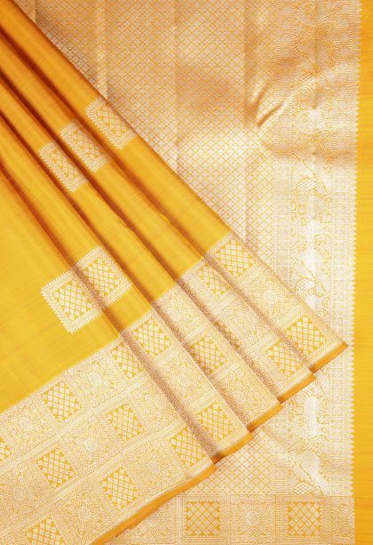 Gold Kanchipuram Silk Sarees with Silver Zari Buttis (small Dots Or Motifs)
