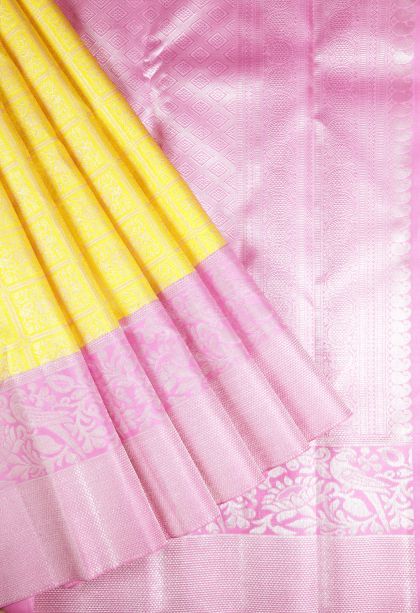 Lemon Yellow Kanchipuram Silk Sarees with Silver Zari Floral Patterns