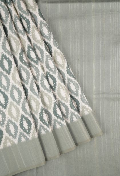 Powder White Tussar Saree with Without Zari Zari Floral Patterns