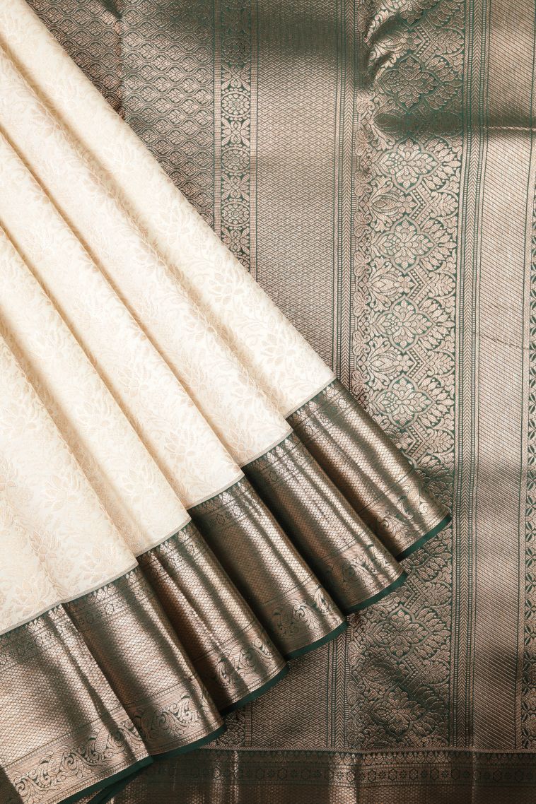 Pearl White Kanchipuram Silk Sarees with Gold Zari Floral Patterns view 1