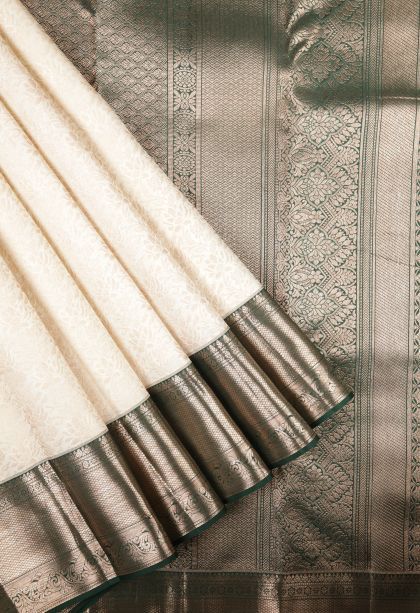 Pearl White Kanchipuram Silk Sarees with Gold Zari Floral Patterns