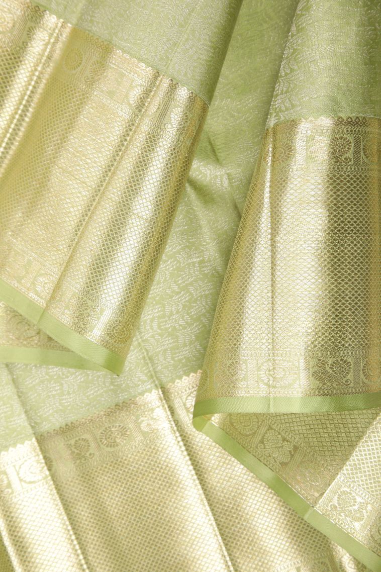 Pistachio Green Kanchipuram Silk Sarees with Gold Zari Floral Patterns view 3