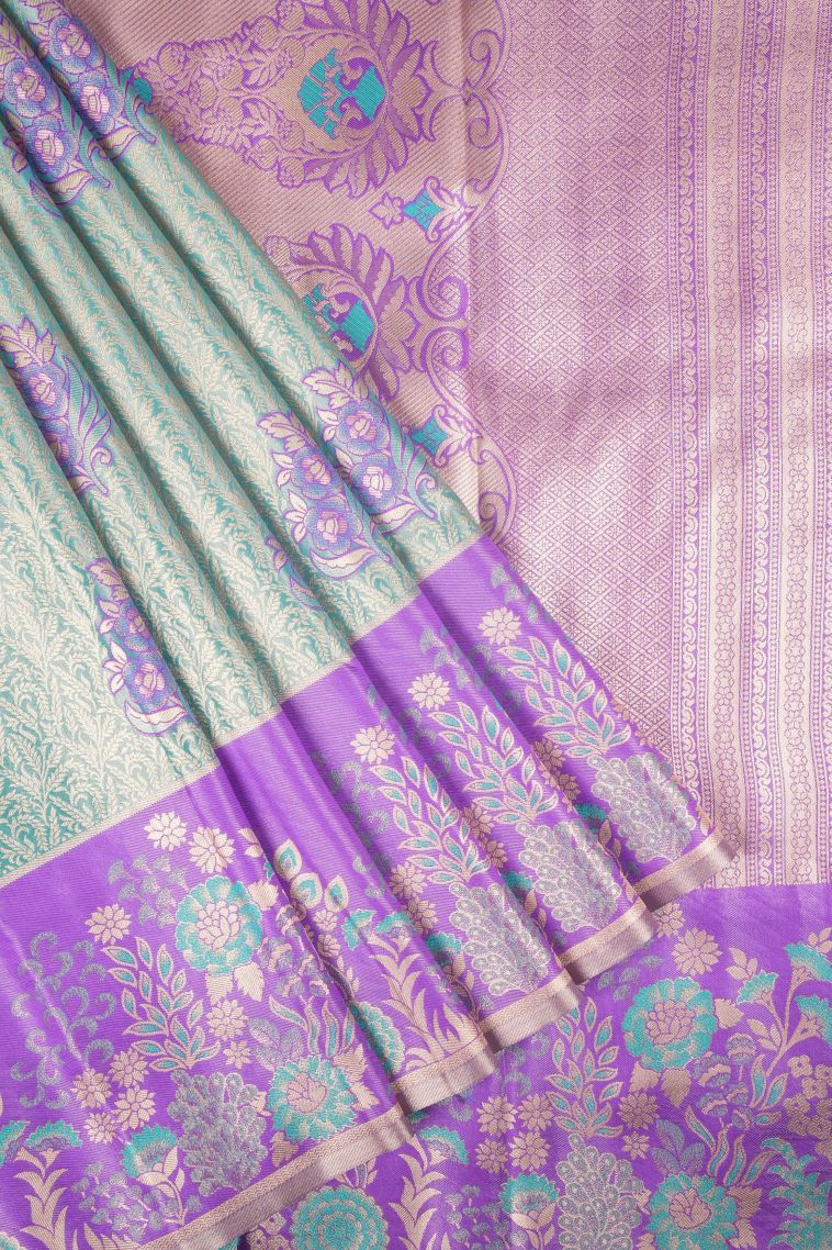 Sky Blue Tissue Silk Sarees with Copper Zari Floral Patterns view 1