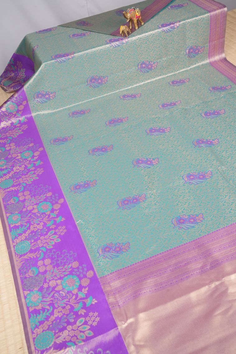 Sky Blue Tissue Silk Sarees with Copper Zari Floral Patterns view 2