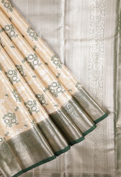 Cream White Tissue Silk Sarees with Silver Zari Floral Patterns