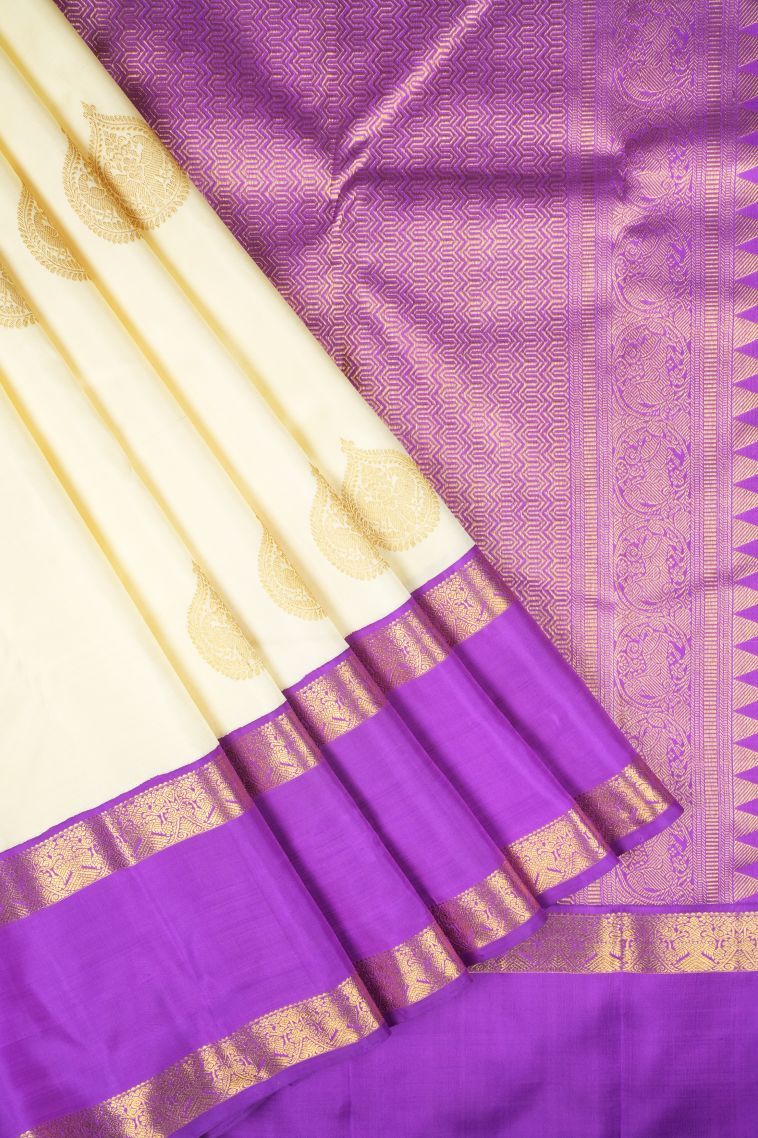 Cream White Kanchipuram Silk Sarees with Gold Zari Peacock Motifs view 1