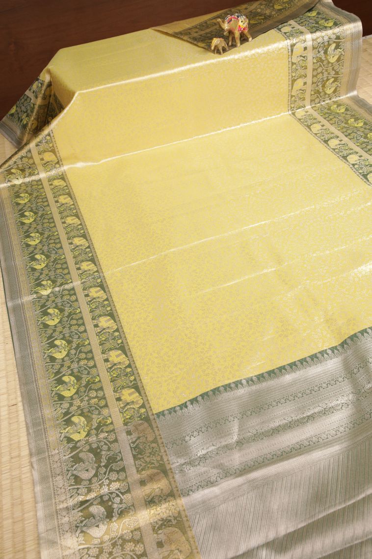Lemon Yellow Tissue Silk Sarees with Silver Zari Floral Patterns view 2