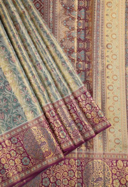 Cerulean Blue Kanchipuram Silk Sarees with Gold And Silver Zari Floral Patterns