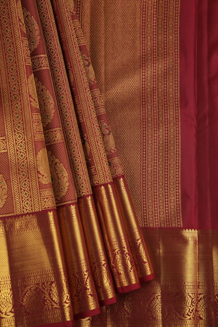Apple Red Kanchipuram Silk Sarees with Gold Zari Peacock Motifs view 1