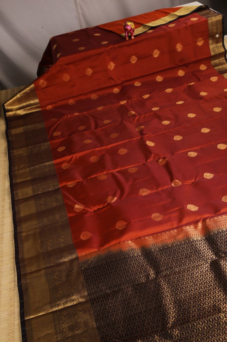 Clay Orange Soft Silk Saree with Gold Zari Thilagam Puttas view 2