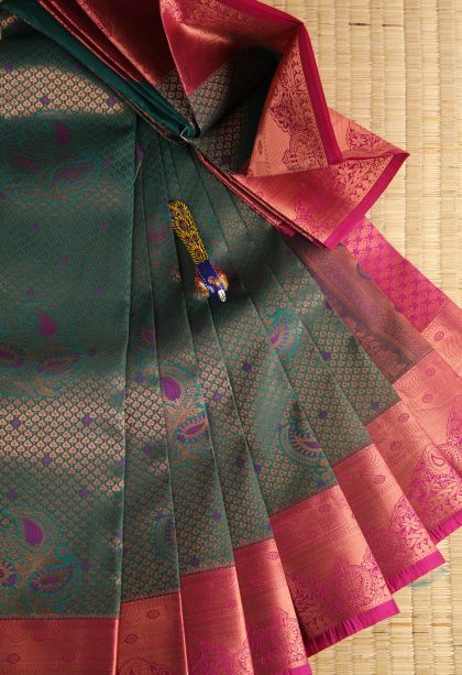 Pine Green Visiri Madippu Silk Sarees with Copper Zari Floral Patterns