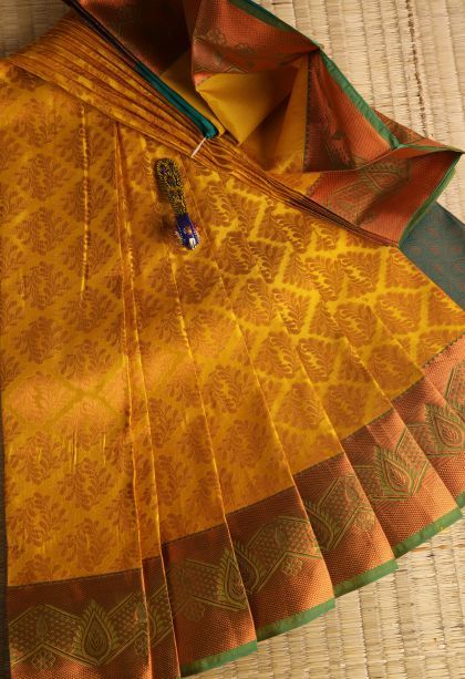 Honey Orange Visiri Madippu Silk Sarees with Copper Zari Floral Patterns