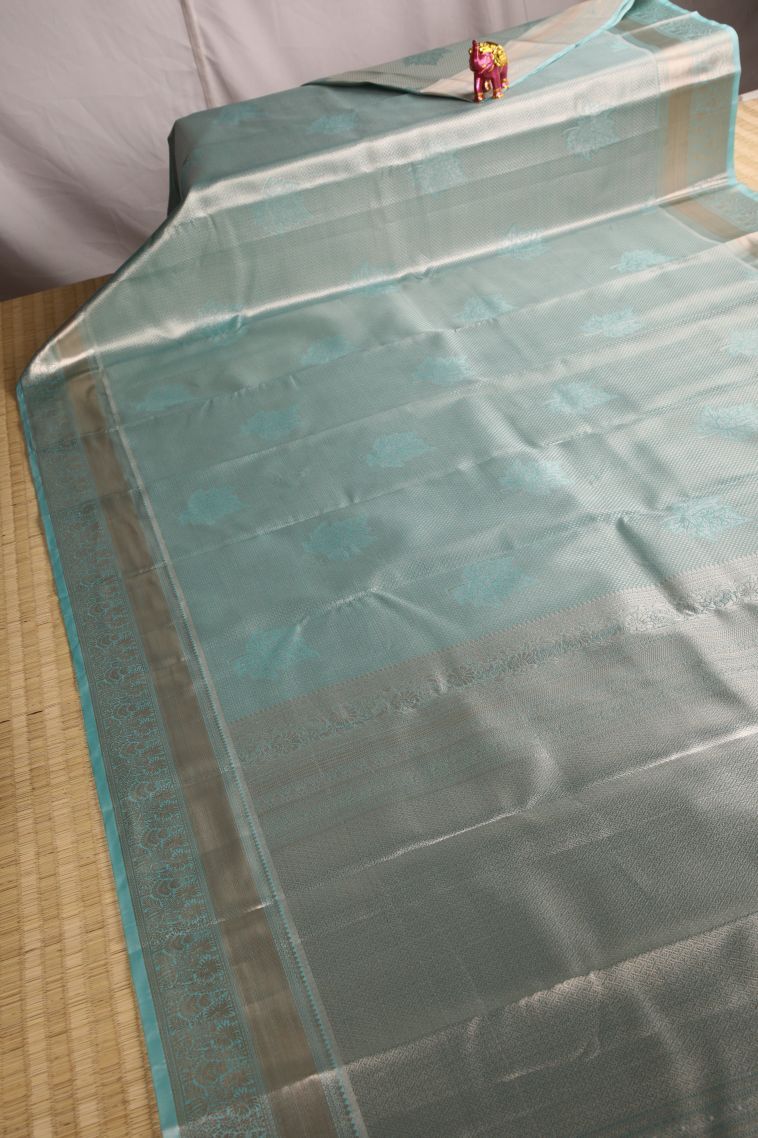 Peacock Blue Tissue Silk Sarees with Gold Zari Floral Patterns view 2