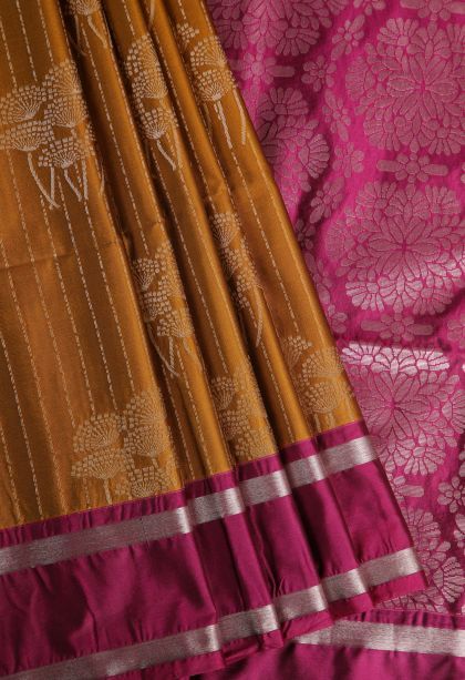 Cider Orange Soft Silk Saree with Silver Zari Floral Puttas
