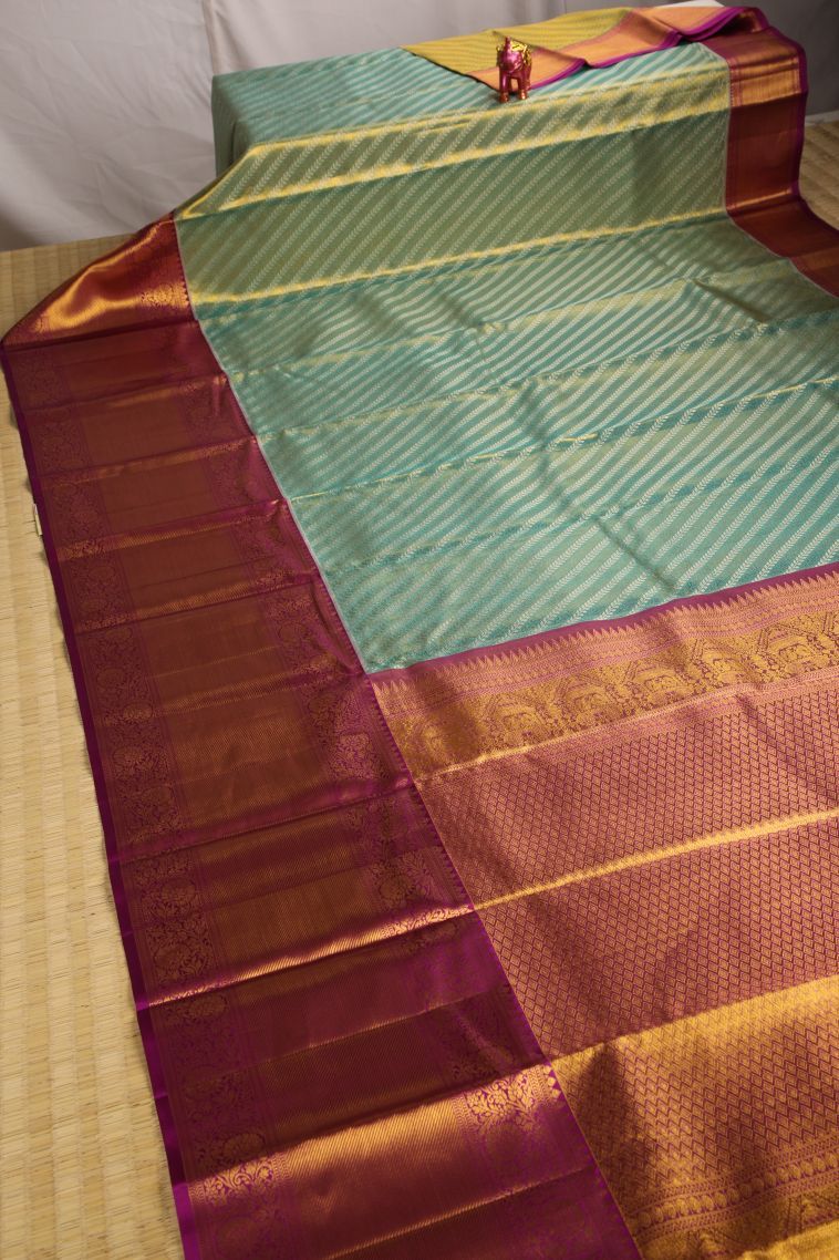 Pistachio Green Kanchipuram Silk Sarees with Gold Zari Geometric Shapes view 2