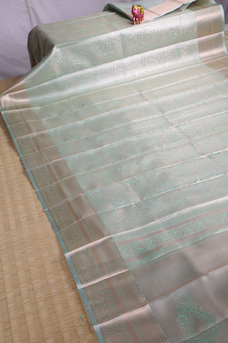 Sky Blue Tissue Silk Sarees with Copper Zari Floral Patterns view 2