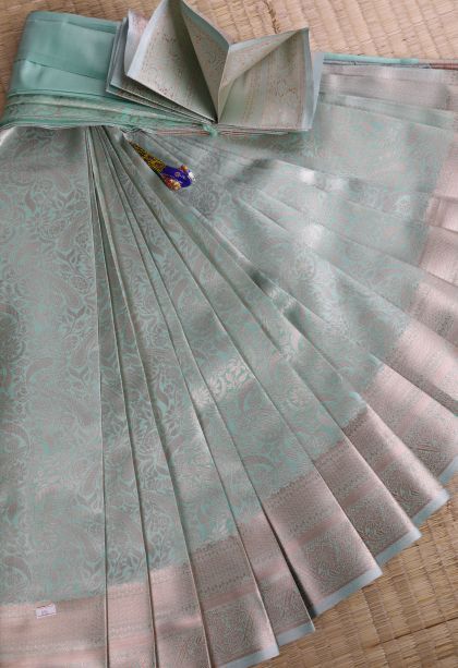 Sky Blue Tissue Silk Sarees with Copper Zari Floral Patterns